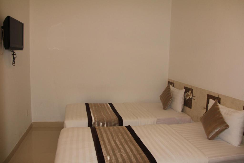 New Sunny Hotel Ho Chi Minh-byen Rom bilde